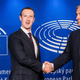 European Parliament President Antonio Tajani, right, welcomes Facebook CEO Mark Zuckerberg upon his arrival at the EU Parliament in Brussels on Tuesday, May 22, 2018.